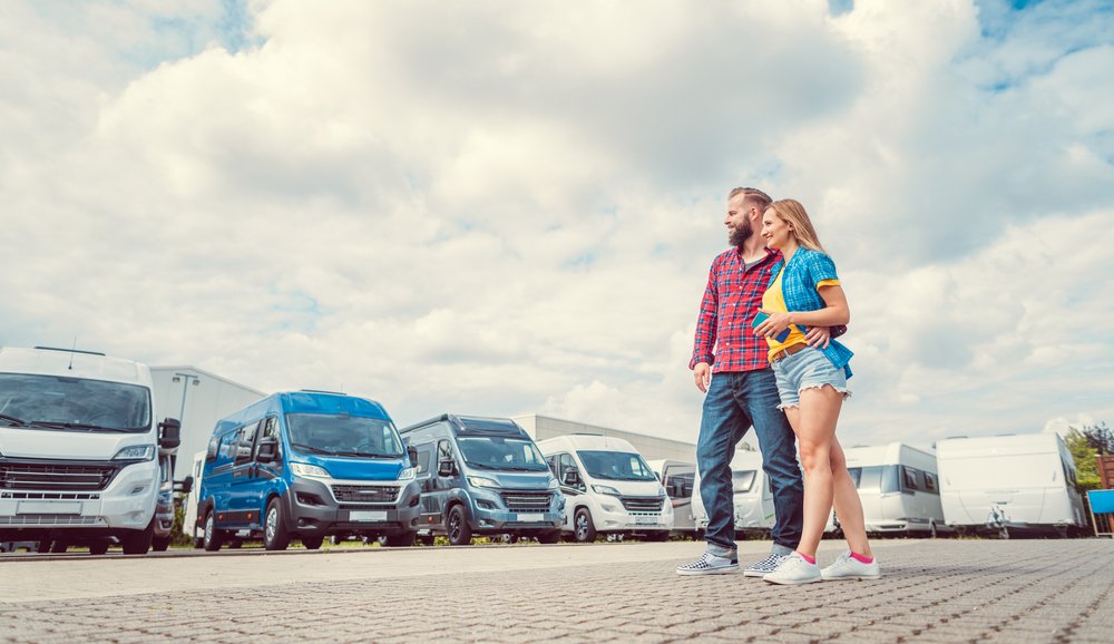 couple looking at vans